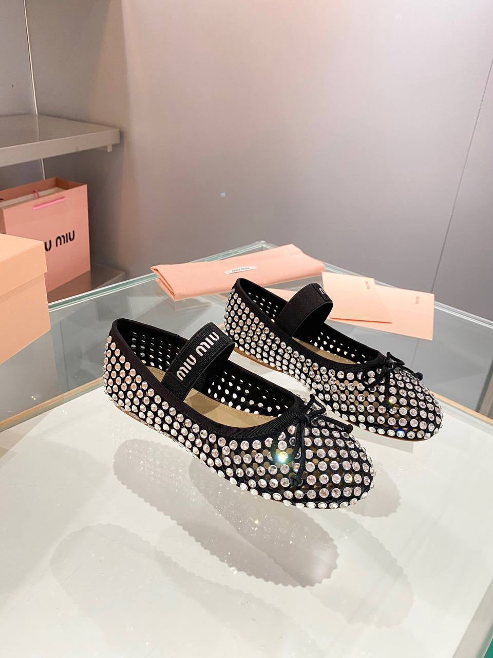 Miu Miu Logo-strap embellished ballet flats