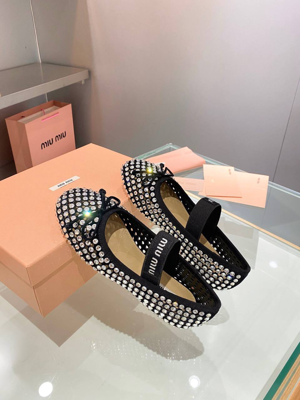 Miu Miu Logo-strap embellished ballet flats