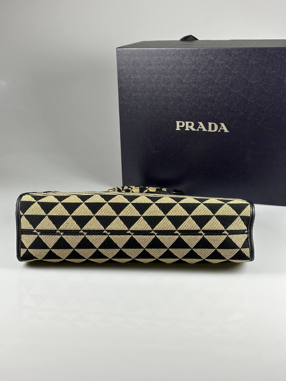Prada Symbole embroidered fabric handbag