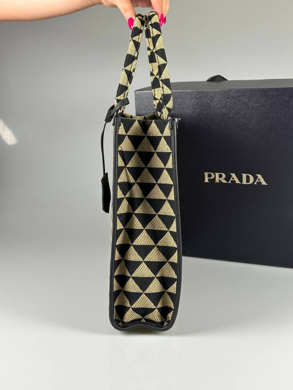 Prada Symbole embroidered fabric handbag