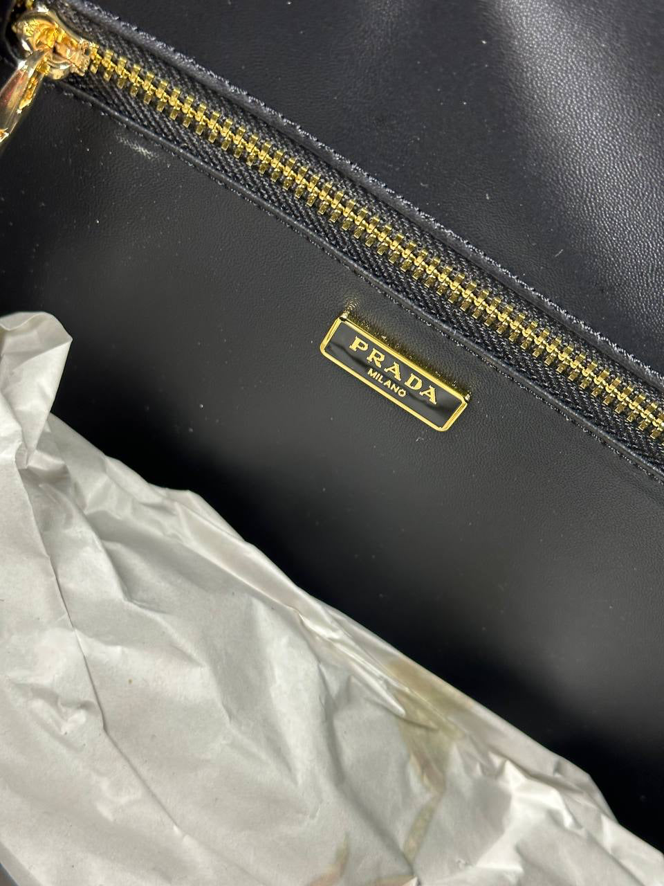 Prada Symbole embroidered fabric handbag