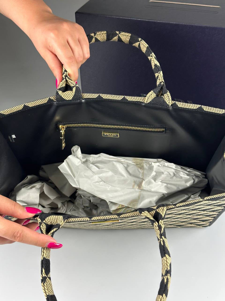 Prada Symbole embroidered fabric handbag