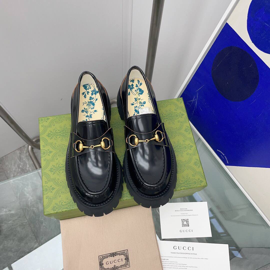 Gucci Leather lug sole loafers